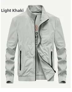 Close-up of light khaki stand collar jacket with fashion logo and zipper pocket detail