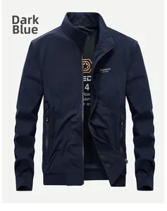 Detail of navy blue jacket featuring fashion embroidery and high-quality zipper hardware