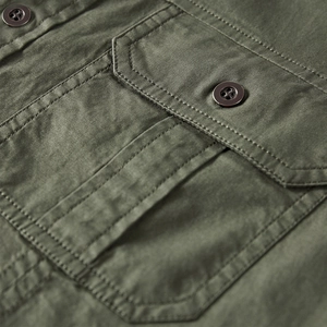 Army green military style cotton shirt with functional cargo pocket and flap detail