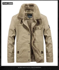 Close-up of khaki winter jacket with thick sherpa fleece lining and outdoor embroidery