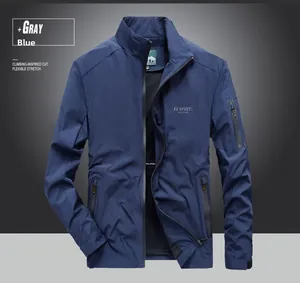 Detail of navy blue windproof jacket with FS SPORTS logo and sleeve zipper pocket