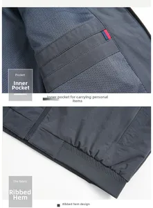 Detail of jacket showing mesh lining inner pocket and elastic ribbed hem with zipper