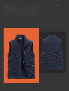 Detail view of men's navy blue fleece vest featuring stand collar and zip pockets