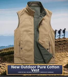 Detail of reversible cotton outdoor vest showing high-quality zipper and khaki texture