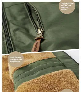 Détail de veste outdoor avec poches zippées, doublure polaire et tirette en cuir