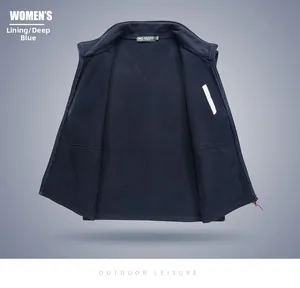 Close-up of deep blue women's outdoor vest featuring soft fleece lining and high collar detail