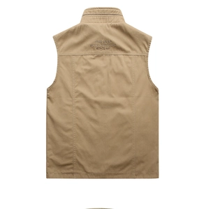 Detail view of khaki vest featuring Free Spirit embroidery and durable stand collar