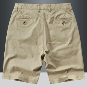 Back view of men's casual khaki cotton shorts with symmetrical welt pockets and buttons
