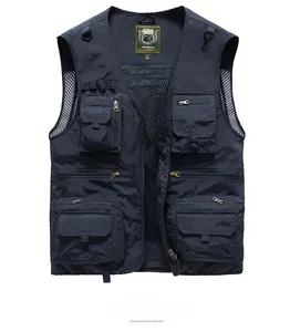 Detail of dark blue outdoor vest showing multiple functional pockets and mesh lining texture