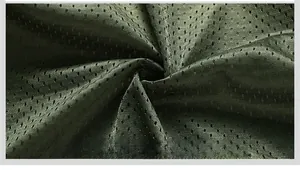 Detail of breathable dark olive green mesh lining on a men's lightweight spring jacket
