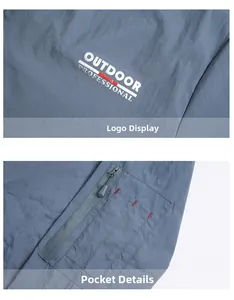 Détail de la veste outdoor montrant le logo et la fermeture éclair avec couture rouge