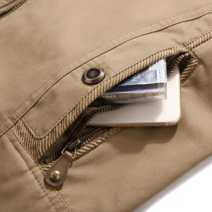Men's khaki reversible vest with deep metal zipper pockets for outdoor fishing