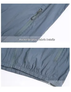 Vue détaillée de la poche zippée et de l'ourlet élastique sur la veste de protection solaire