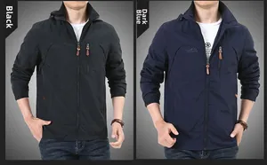 Detail of outdoor hooded jacket showing zipper with leather pull and adjustable cuffs