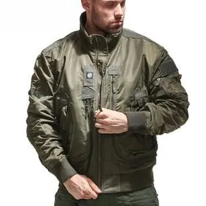 Close-up of military green tactical jacket with arm pockets and ribbed cuffs