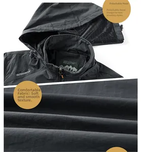 Vue macro d'une veste outdoor avec capuche amovible et doublure en maille douce respirante