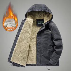 Detailed close-up of heavy dark grey jacket with warm sherpa lining and chest embroidery