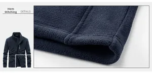 Détail de l'ourlet en polaire haute densité avec coutures doubles précises en bleu marine