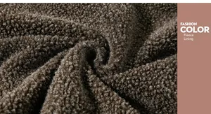 Close-up detail of the warm brown fleece lining texture for the winter jacket
