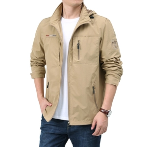 Men's khaki waterproof outdoor jacket with adjustable hood and shield embroidery