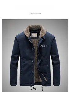 Detail of navy blue fleece jacket with warm wool collar and P.L.A.N. chest print