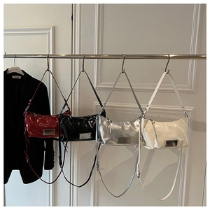 Four colors of glossy tote bags including burgundy, black, silver, and cream white displayed