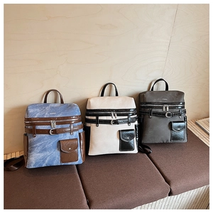 Detailed comparison of vintage leather backpacks in denim blue, beige, and dark grey colors