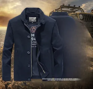 Detail of navy blue fleece jacket with PLAN logo and heavy duty zipper closure