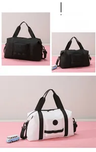 Close-up of durable oxford fabric travel bag with adjustable strap and front zip pocket