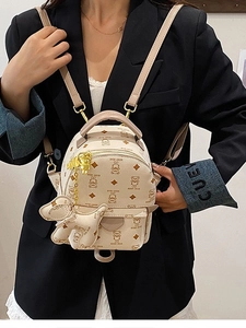 Chic beige teddy bear print mini backpack with PU leather and luxury dog charm