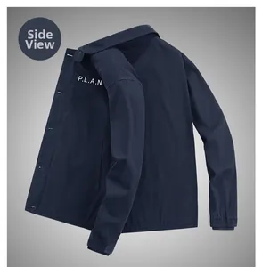 Detail view of navy blue sherpa lined jacket with white P.L.A.N. lettering on the chest