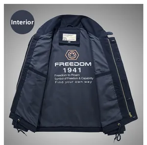 Detail of navy deck jacket featuring fleece lining with Freedom 1941 graphic print