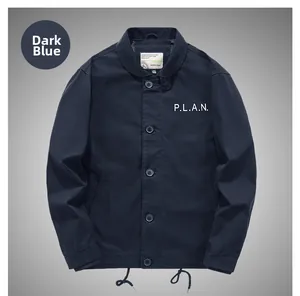 Detail of navy lamb wool jacket featuring P.L.A.N. chest print and adjustable drawstring hem