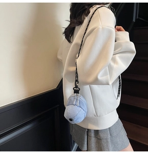 Mini light blue baseball cap coin purse with woven lanyard and dual zipper details