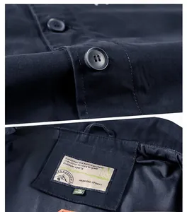 Detail of durable resin buttons and size label on heavy cotton deck jacket