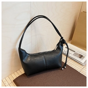 Minimalist black matte leather underarm bag with double straps and side knot detail