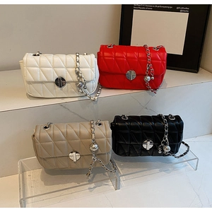 Detailed display of four quilted chain bags in white, red, khaki, and black colors