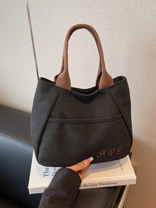 Large capacity black canvas bucket tote bag with brown straps and XQG embroidery