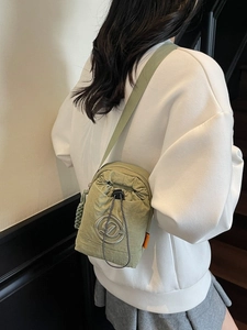 Sage green mini nylon crossbody bag with drawstring closure for daily outdoor use