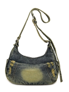 Distressed denim crescent shoulder bag in two-tone wash finish with multiple pockets