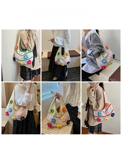 Détails d'un sac cabas au crochet blanc avec motifs de fleurs tricotées en 3D
