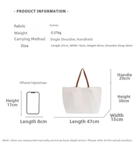 Detailed size chart of the canvas tote bag with brown straps and dimensions listed