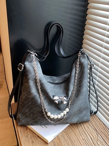 Dark grey vintage texture hobo tote bag with pearl chain and metal bow charm details