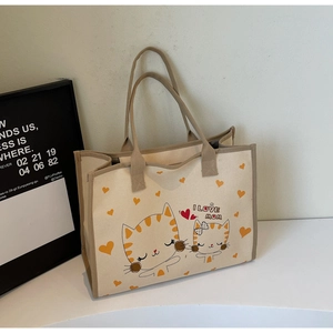 Détail du sac cabas en toile avec imprimés de chats mignons et texte I LOVE MOM