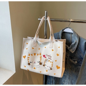 Détail du sac cabas en toile blanche avec imprimé chat orange et texte I LOVE MOM