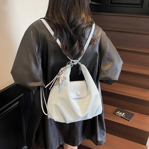 Light blue patent leather backpack with star charm for women, stylish summer shoulder bag