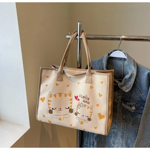 Détail du sac cabas en toile avec chats de dessin animé et texte imprimé I LOVE MOM
