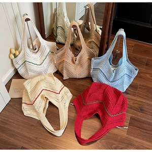 Detail of colorful woven knit tote bags showing various wave patterns and wavy textures
