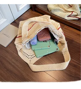 Top view of beige knitted tote bag showing large capacity for tablet and daily items