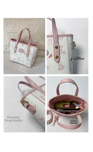 Detail view of pink rabbit print bucket bag showing rivets, strap hooks and large capacity